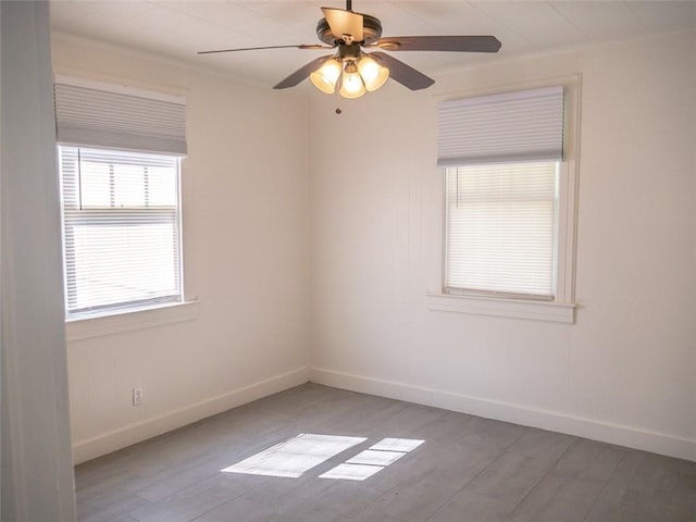 unfurnished room with light hardwood / wood-style flooring and ceiling fan