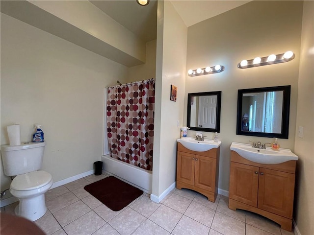 full bathroom with vanity, tile patterned floors, toilet, and shower / bath combo