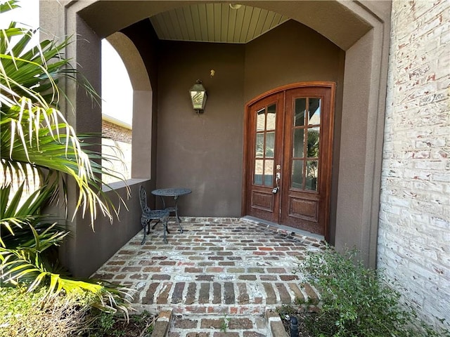 entrance to property featuring french doors