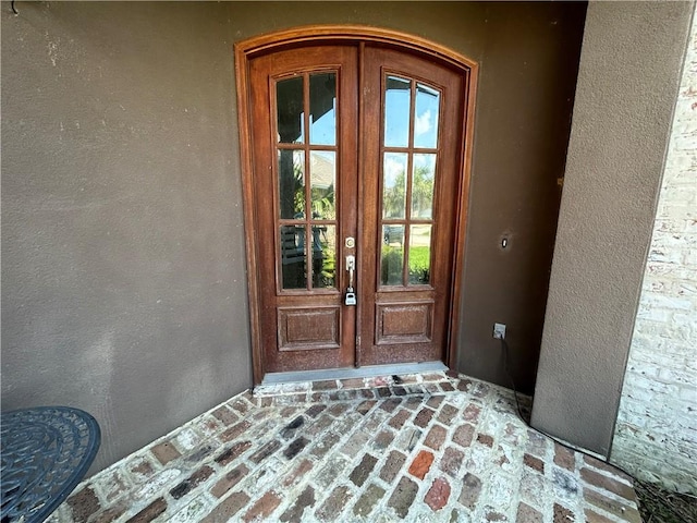 view of exterior entry with french doors