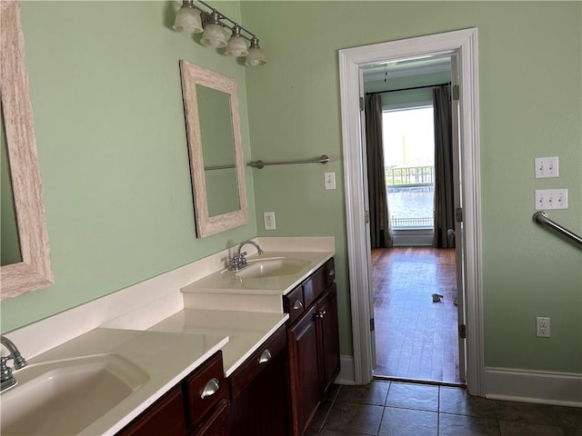 bathroom with vanity and tile patterned floors