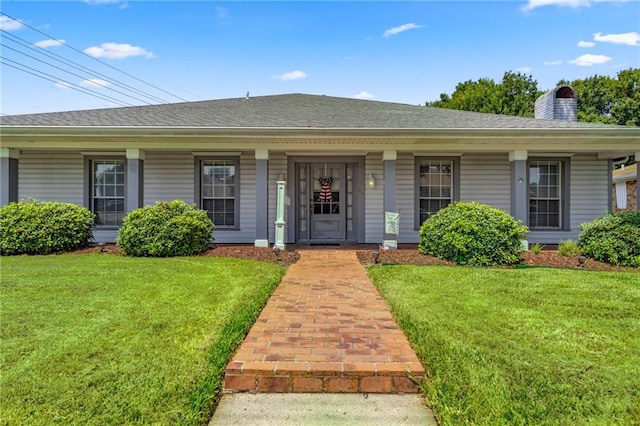 view of front of home with a front lawn