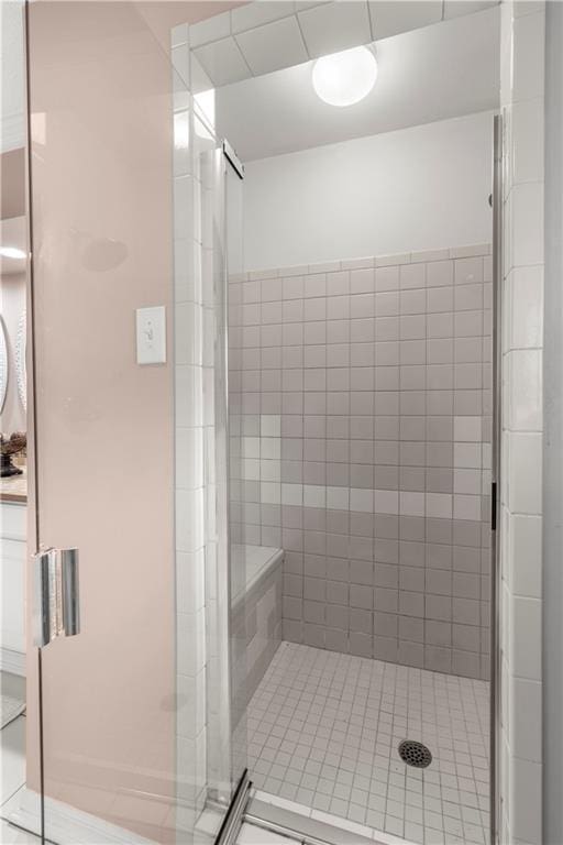 bathroom featuring an enclosed shower