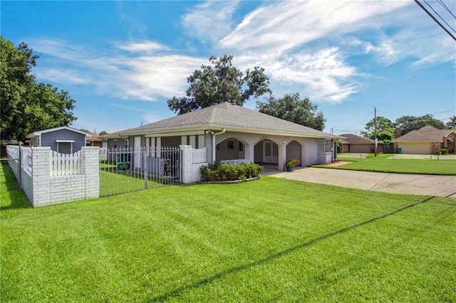 view of front of property featuring a garage and a front lawn