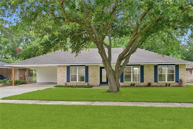 ranch-style house with a front lawn