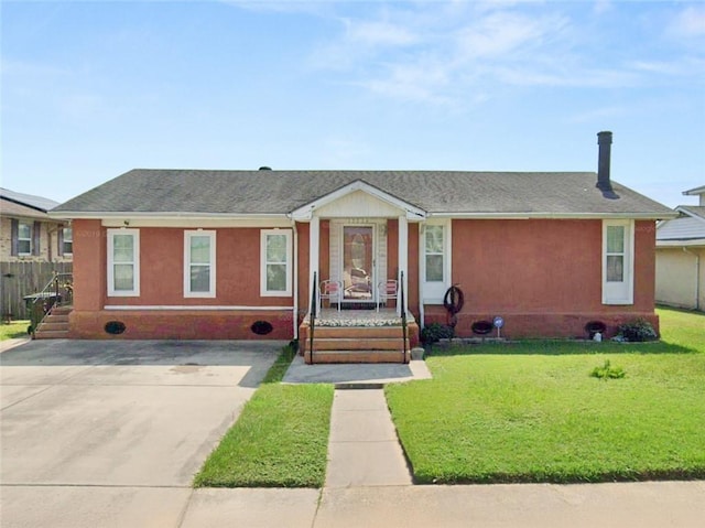 ranch-style house with a front yard