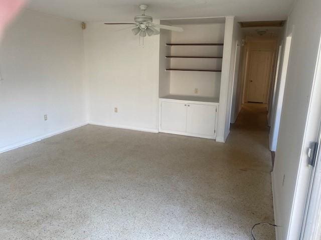 empty room featuring ceiling fan