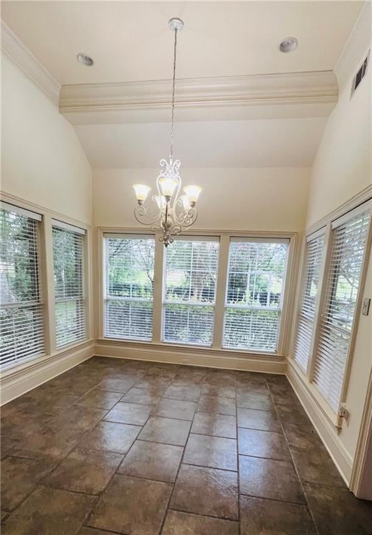 unfurnished sunroom with plenty of natural light and a chandelier