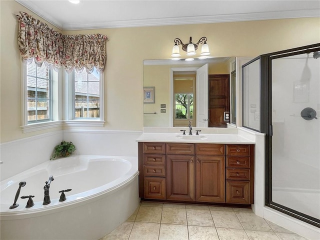 bathroom with tile patterned flooring, vanity, shower with separate bathtub, and ornamental molding