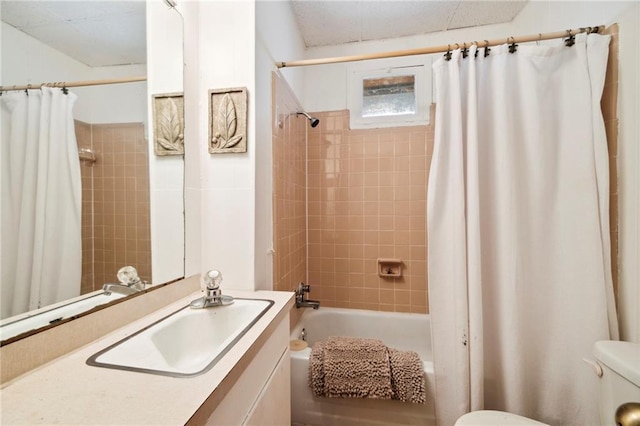 full bathroom with toilet, sink, and shower / tub combo with curtain