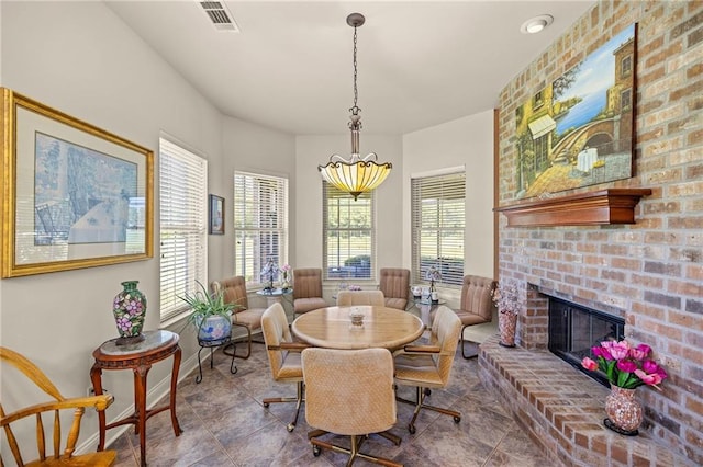 dining room featuring a fireplace