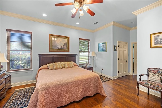 bedroom with ceiling fan, dark wood-type flooring, and ornamental molding