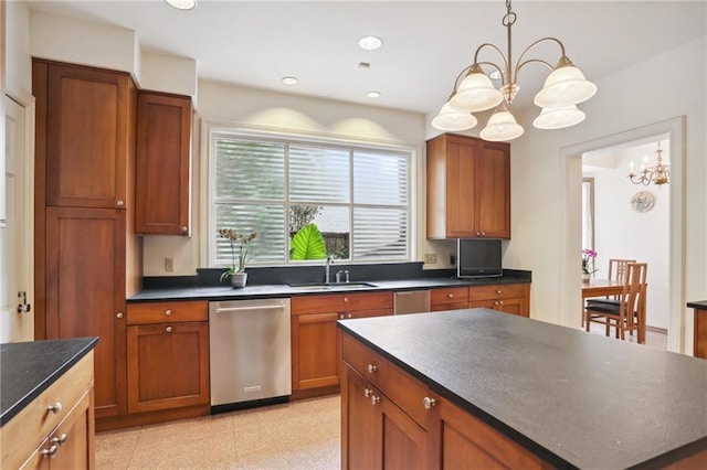 kitchen with dishwasher, sink, decorative light fixtures, a kitchen island, and a chandelier