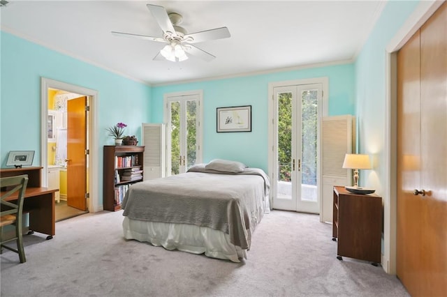 carpeted bedroom with access to exterior, french doors, ceiling fan, and ornamental molding