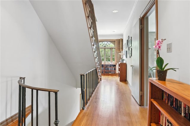 hall with light hardwood / wood-style flooring