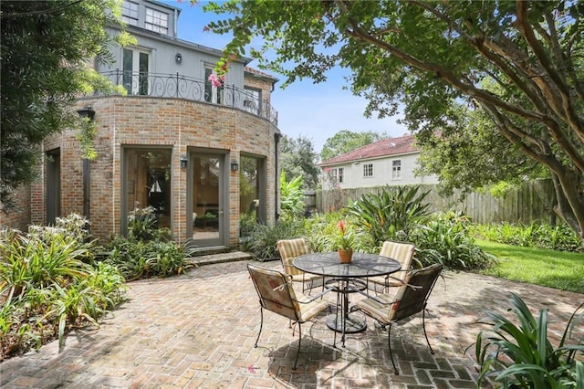 view of patio / terrace with a balcony