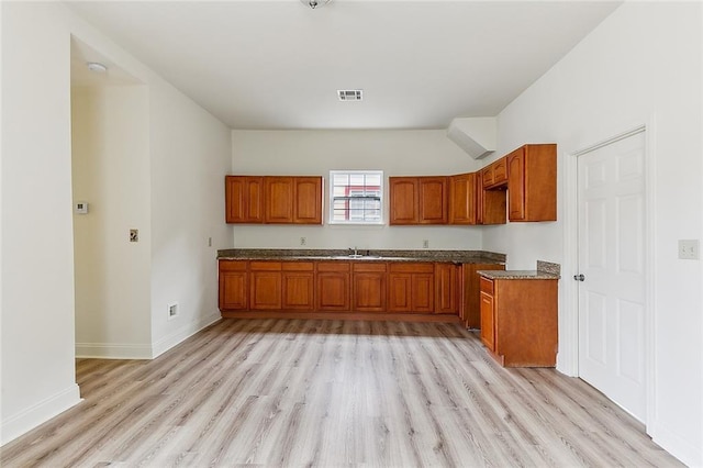 kitchen featuring light hardwood / wood-style floors and sink