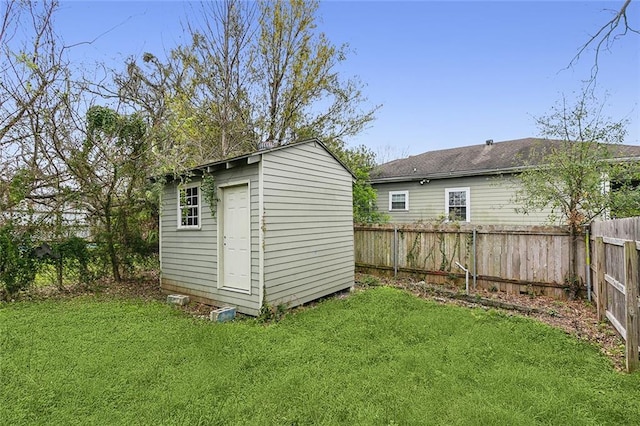 view of outdoor structure with a lawn