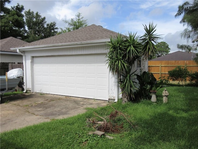 garage with a yard