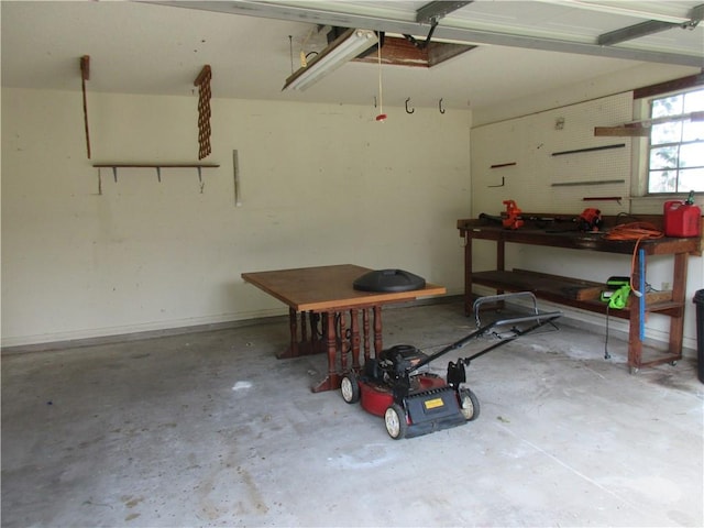 garage with a workshop area