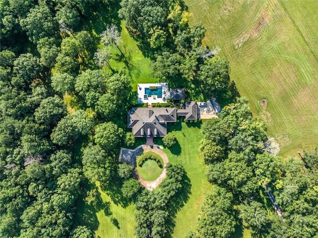 bird's eye view featuring a view of trees