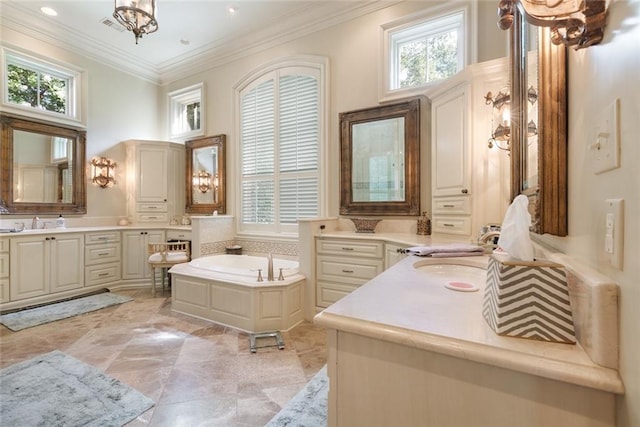 full bathroom featuring a bath, two vanities, a sink, ornamental molding, and a notable chandelier