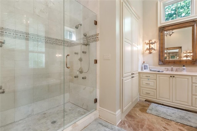 full bath with vanity and a stall shower