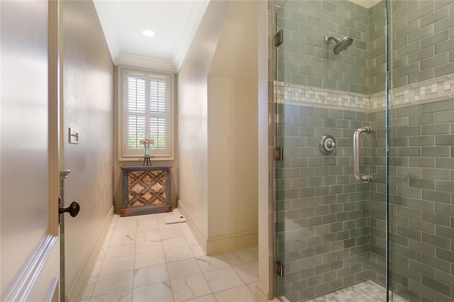 full bathroom with baseboards, marble finish floor, ornamental molding, and a shower stall