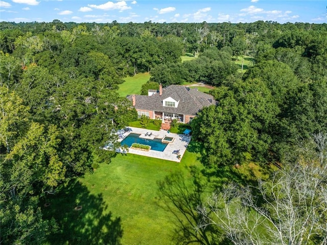 bird's eye view with a forest view