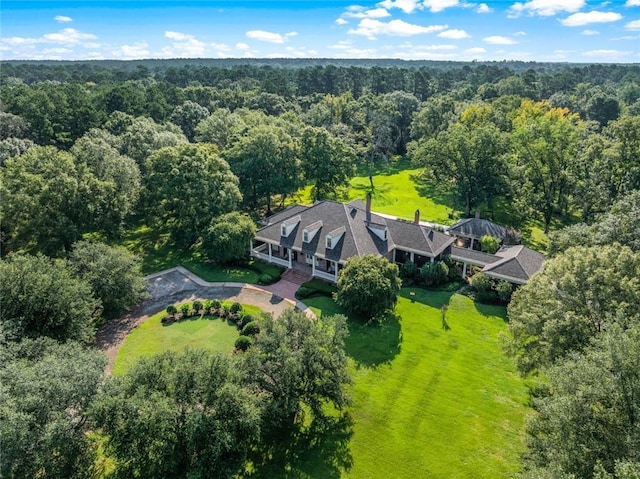 drone / aerial view with a view of trees