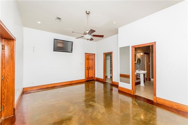 500 W Willow St, Ponchatoula, LA 70454 - unfurnished room with ceiling fan and concrete floors