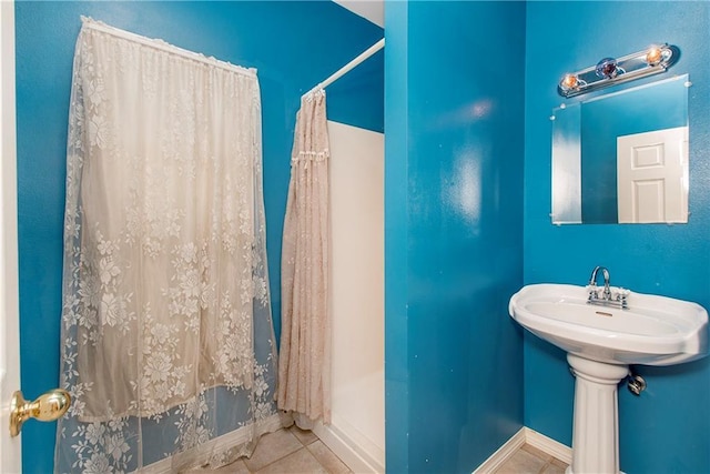 500 W Willow St, Ponchatoula, LA 70454 - bathroom featuring tile patterned floors and walk in shower