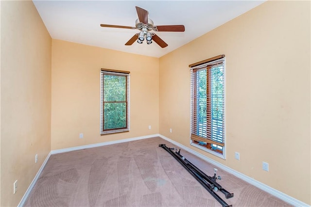500 W Willow St, Ponchatoula, LA 70454 - empty room featuring a wealth of natural light, ceiling fan, and light carpet