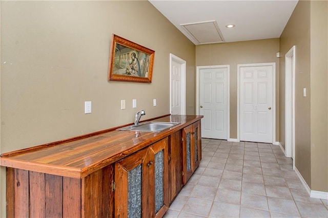 500 W Willow St, Ponchatoula, LA 70454 - hall featuring light tile patterned floors and sink