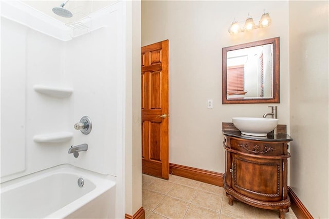 500 W Willow St, Ponchatoula, LA 70454 - bathroom featuring shower / bathing tub combination, vanity, and tile patterned floors