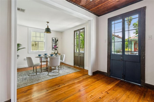 entryway with wood ceiling and wood-type flooring