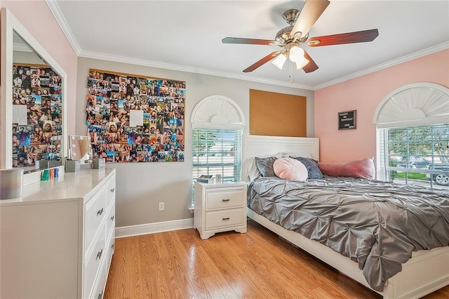 bedroom with ceiling fan, ornamental molding, and light hardwood / wood-style flooring