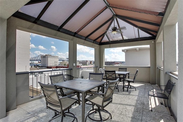 exterior space featuring lofted ceiling and ceiling fan