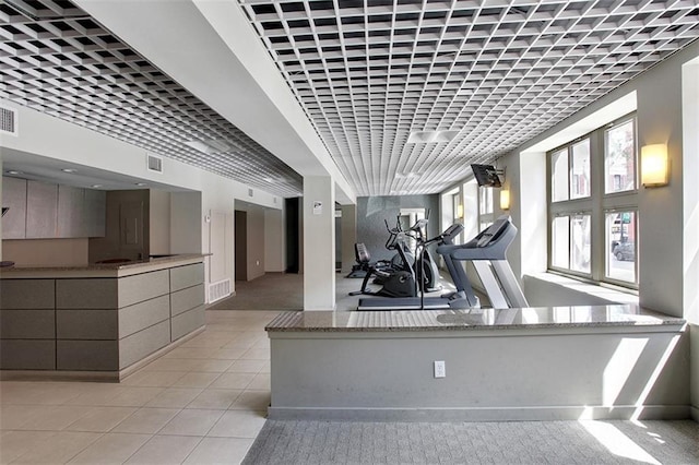 333 Julia St Unit 519, New Orleans, LA 70130 - exercise room with visible vents and tile patterned flooring