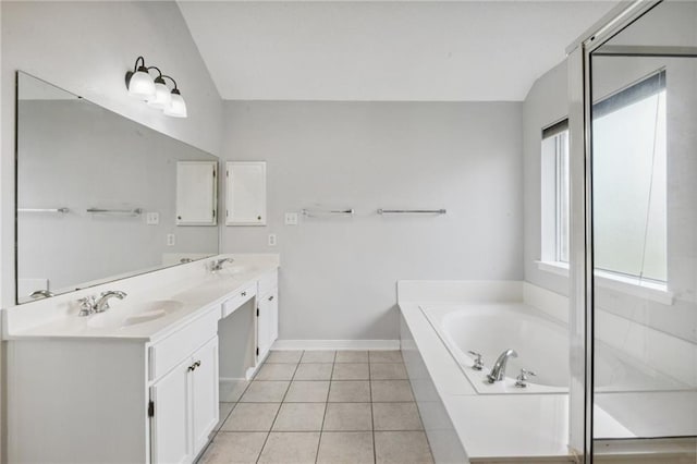 bathroom featuring separate shower and tub, tile patterned flooring, lofted ceiling, and vanity