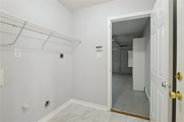 laundry area with gas dryer hookup and hookup for an electric dryer