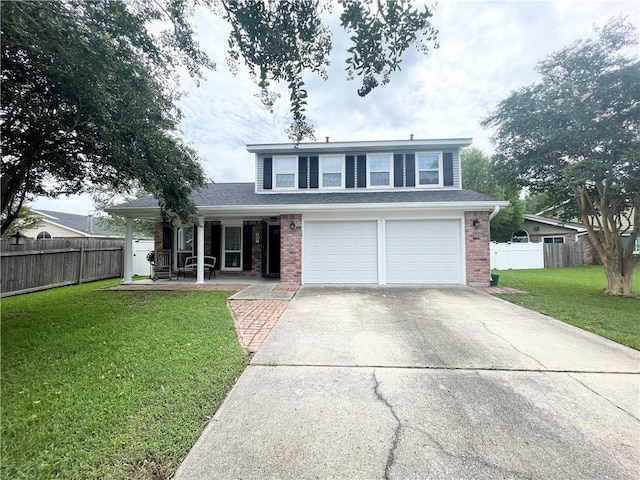 front facade featuring a garage and a front lawn