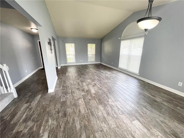 interior space featuring vaulted ceiling and hardwood / wood-style floors