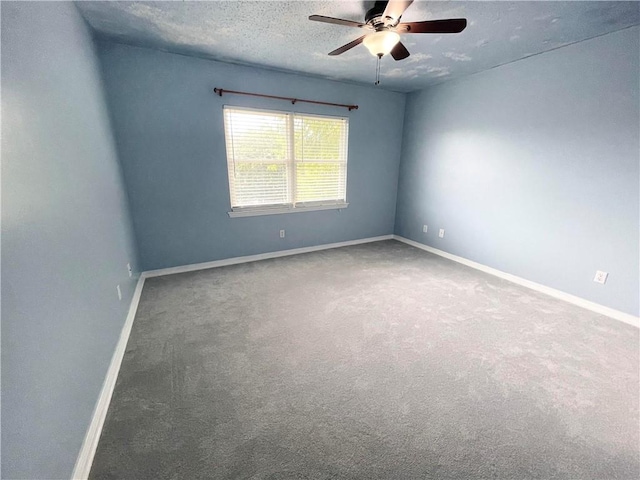 unfurnished room with carpet floors, a textured ceiling, and ceiling fan