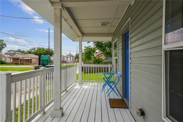 wooden deck featuring a porch