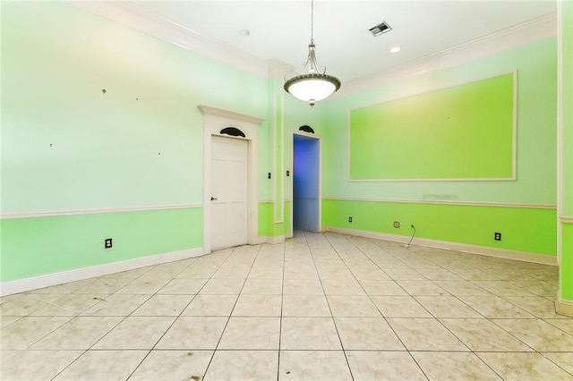 unfurnished room with ornamental molding