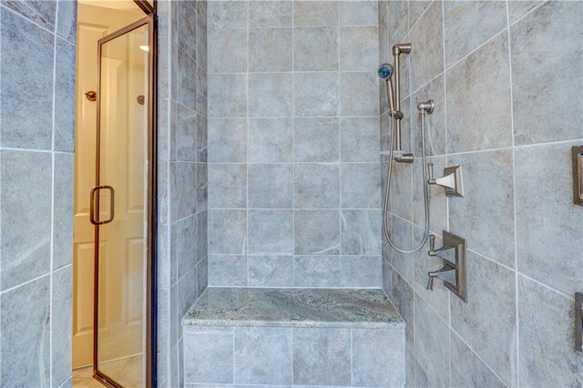 bathroom with an enclosed shower