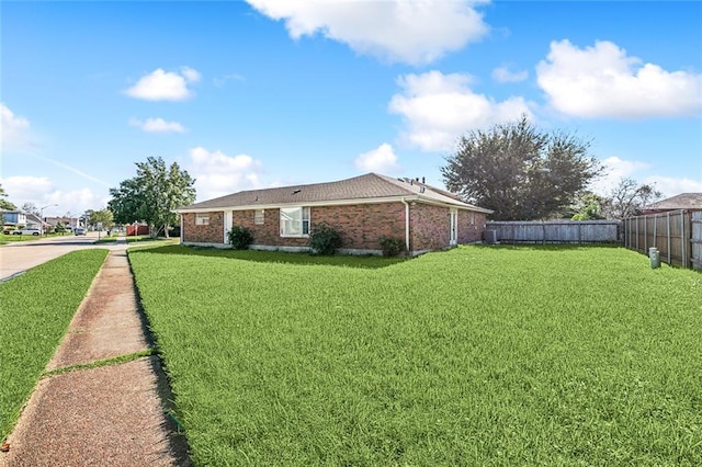 view of property exterior featuring a lawn