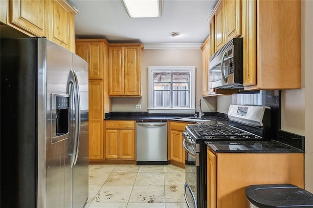 kitchen featuring appliances with stainless steel finishes, light tile patterned floors, sink, and crown molding