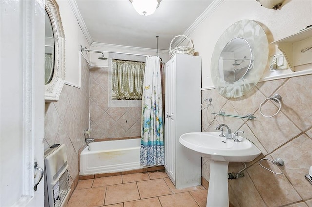 bathroom featuring tile patterned floors, crown molding, tile walls, and shower / bathtub combination with curtain